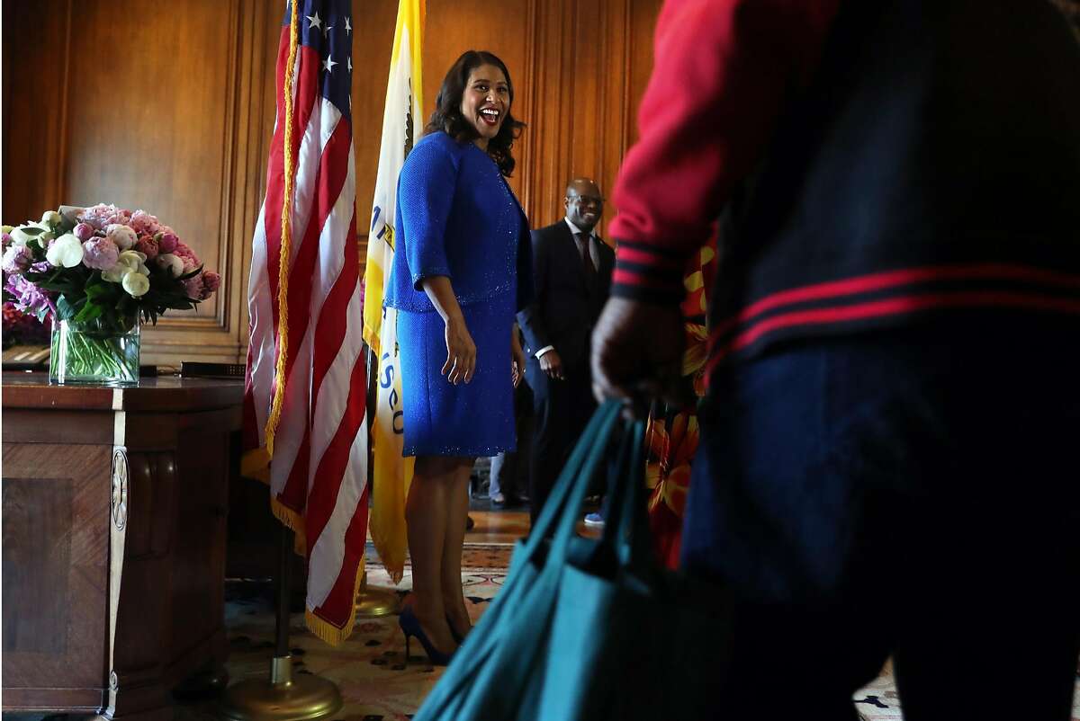 San Francisco Mayor London Breed greets a member of the public in the receiving line after Breed's inauguration at City Hall in San Francisco, Calif. on Wednesday, July 11, 2018.