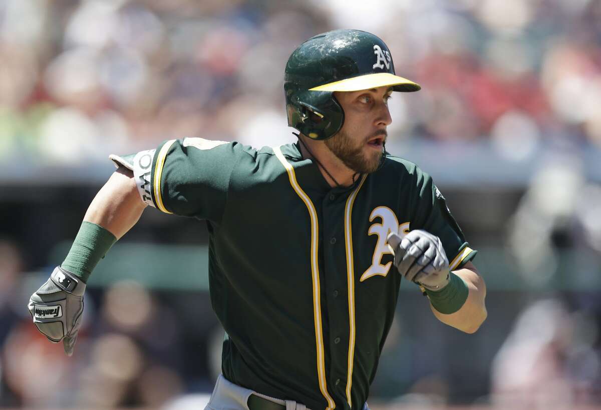 Oakland Athletics' Dustin Fowler runs to first base for a single in the second inning of a baseball game against the Cleveland Indians, Sunday, July 8, 2018, in Cleveland. (AP Photo/Tony Dejak)
