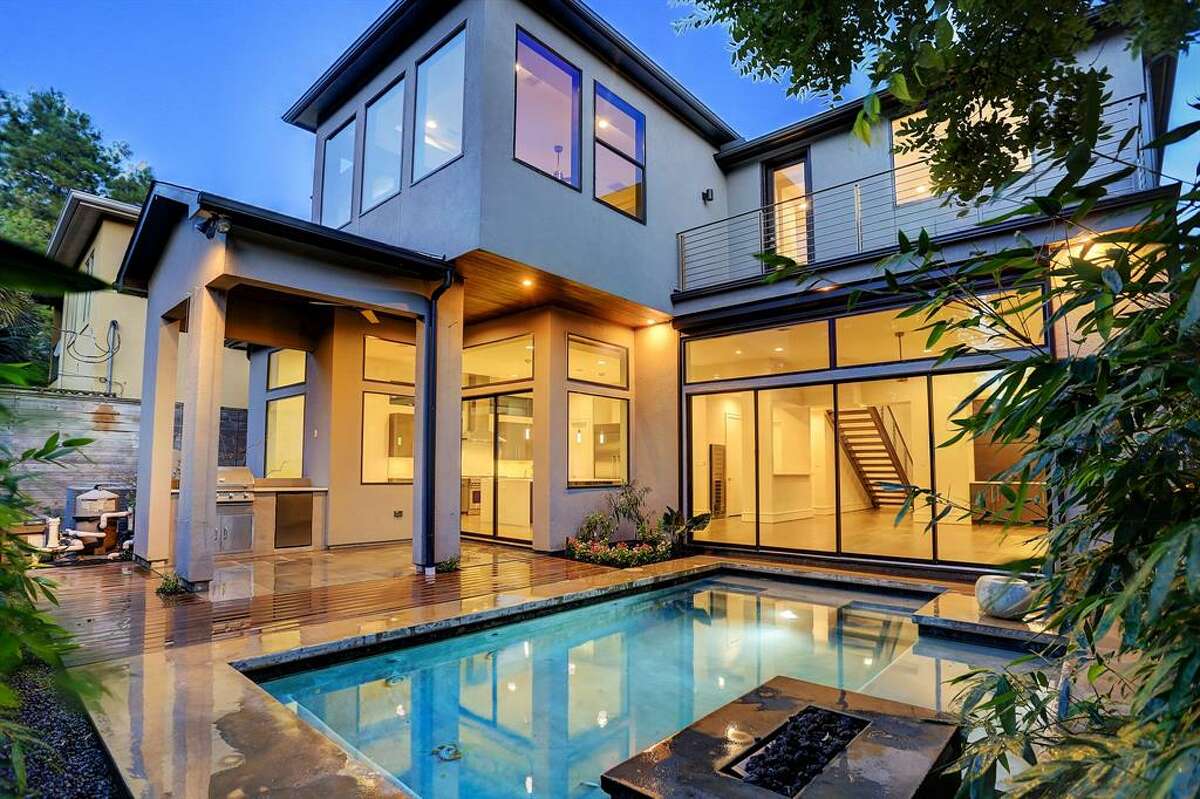 Contemporary home for sale in Upper Kirby stuns with pool, modern finishes