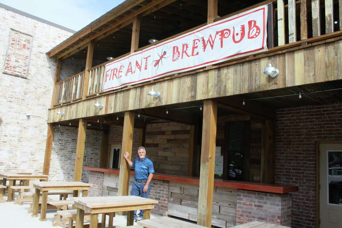 CEO and co-owner of Fire Ant Brewing Co. stands outside of the brew pub that is expected to open in August after more than two years of construction.