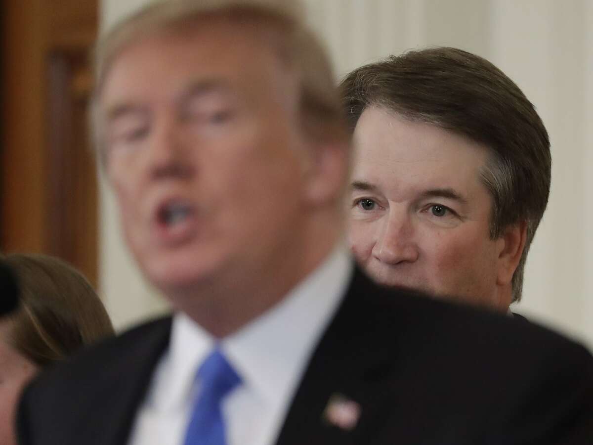 In this July 9, 2018, photo, President Donald Trump speaks as Judge Brett Kavanaugh his Supreme Court nominee, listens in the East Room of the White House in Washington. Trump made his second Supreme Court pick this week. Unless a justice dies, Trump has likely picked his last justice. Trump has speculated that he could appoint a majority of the nine-member court. But it has been three decades since a president has been able to name more than two justices to their life-tenured posts. (AP Photo/Evan Vucci)