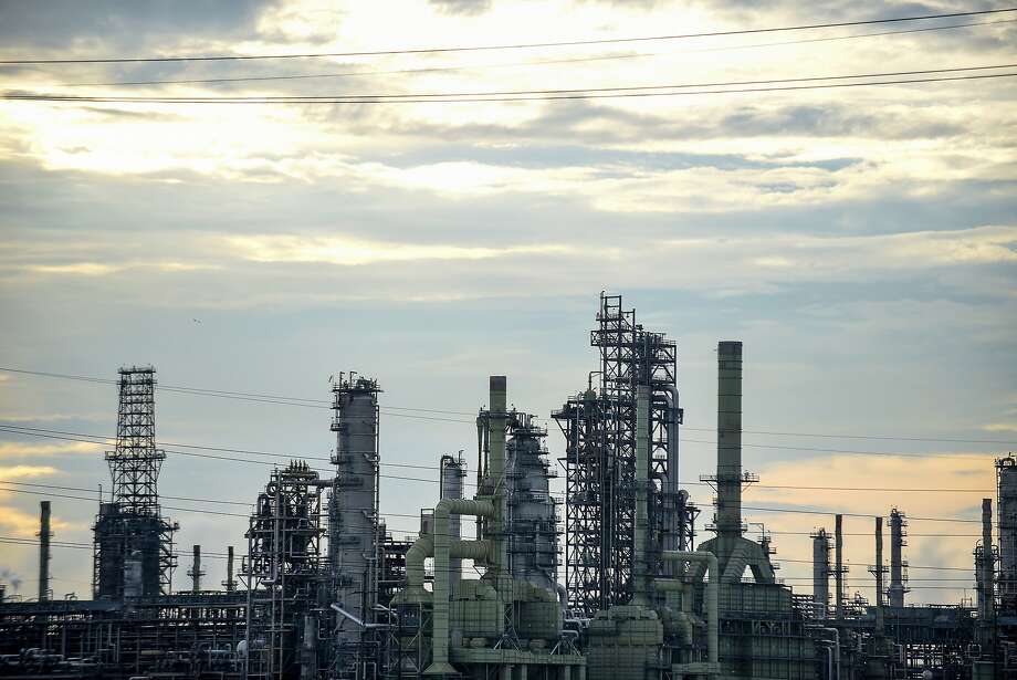 Oil slides near 68 as U.S. crude stocks expand, gasoline drops