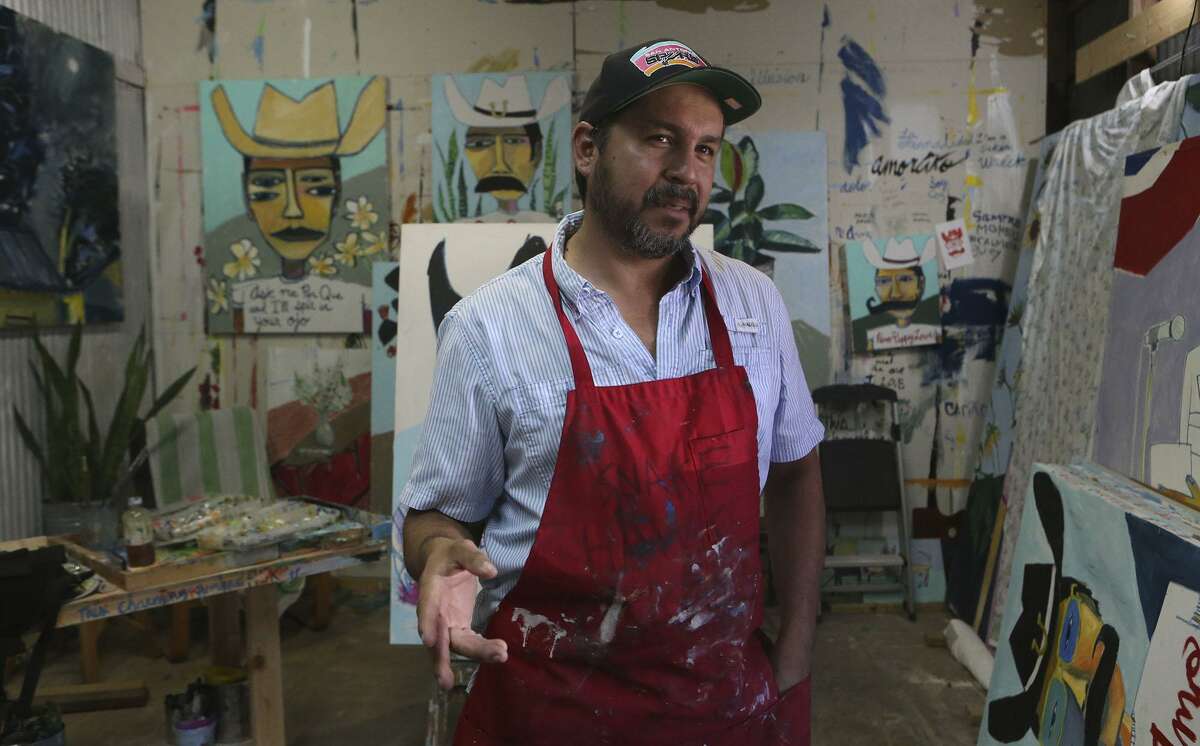 San Antonio artist Cruz Ortiz, shown in his studio in 2016, intends to continue designing special pizza boxes for the local franchise of the Papa John’s pizza chain.