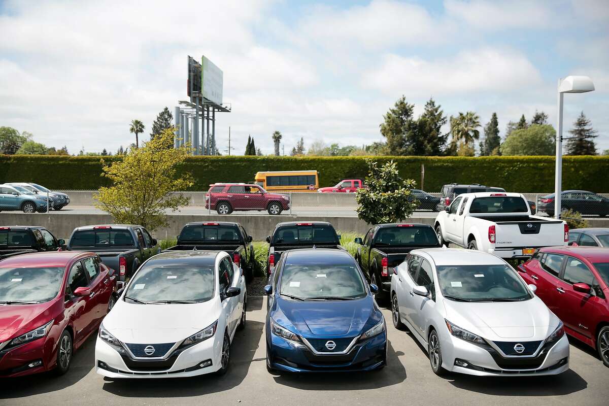 A row of new 2018 Nissan LEAF electric vehicles at the Jim Bone Nissan dealership in Santa Rosa, California, Thursday, May 3, 2018. Author Beth Osborne argues we need a better transportation grid, not more electric vehicles. Ramin Rahimian/Special to The Chronicle