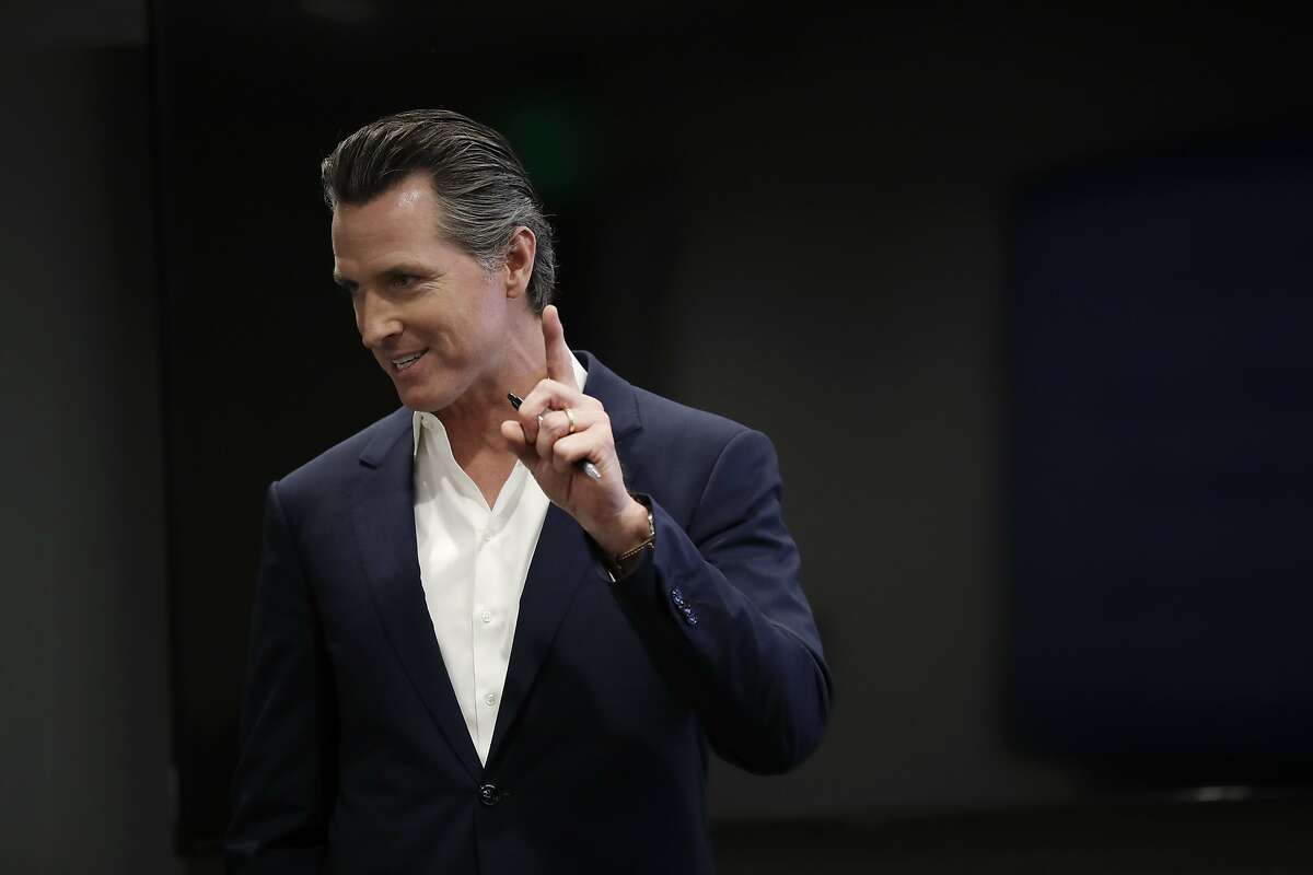 California gubernatorial candidate Lt. Gov. Gavin Newsom speaks during a visit with veterans and their families at the 2-1-1 Connections Center Friday, May 25, 2018, in San Diego. (AP Photo/Gregory Bull)
