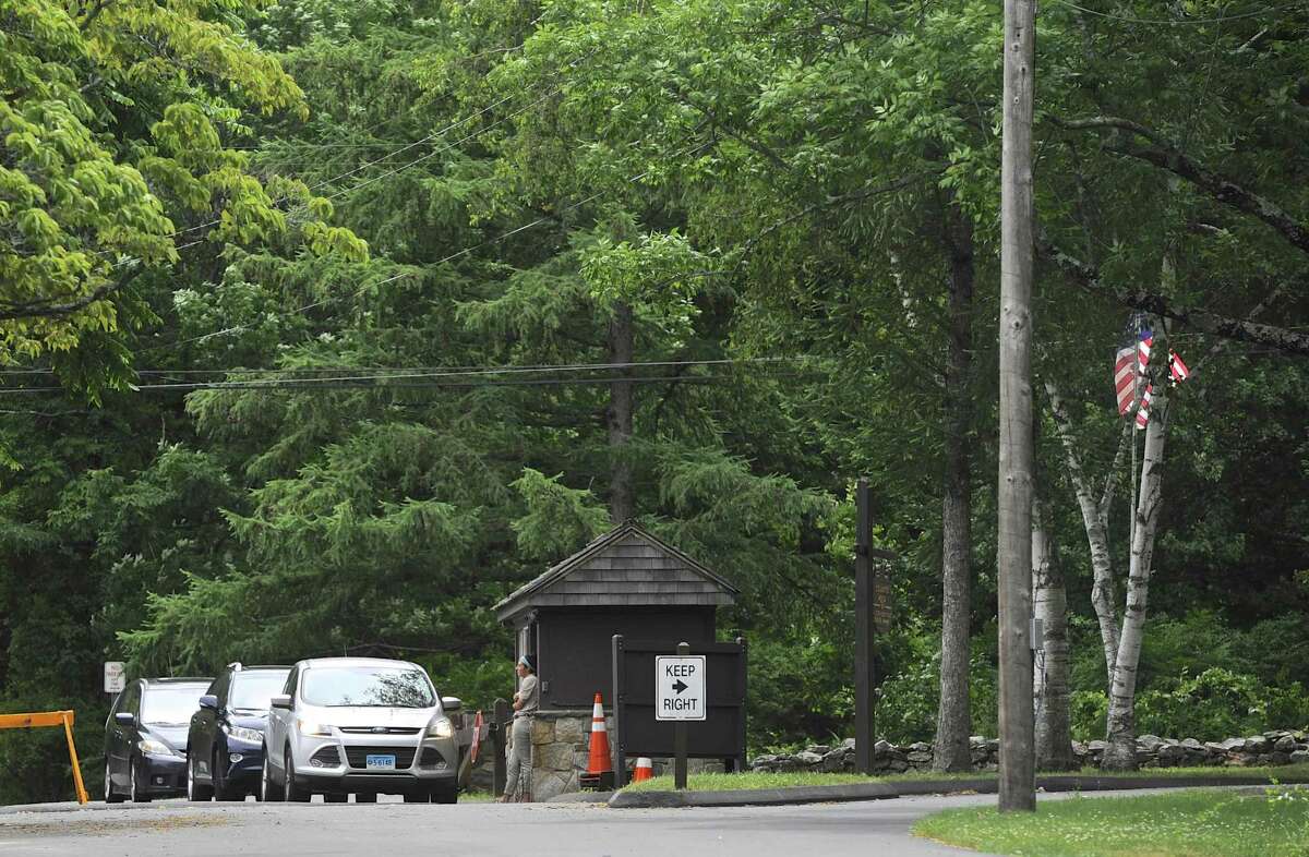 Cars line up at the entrance to Squantz Pond State Park, in New Fairfield, on the first day of the Forth of July Holiday weekend. Saturday, July 2, 2016, in New Fairfield, Conn.