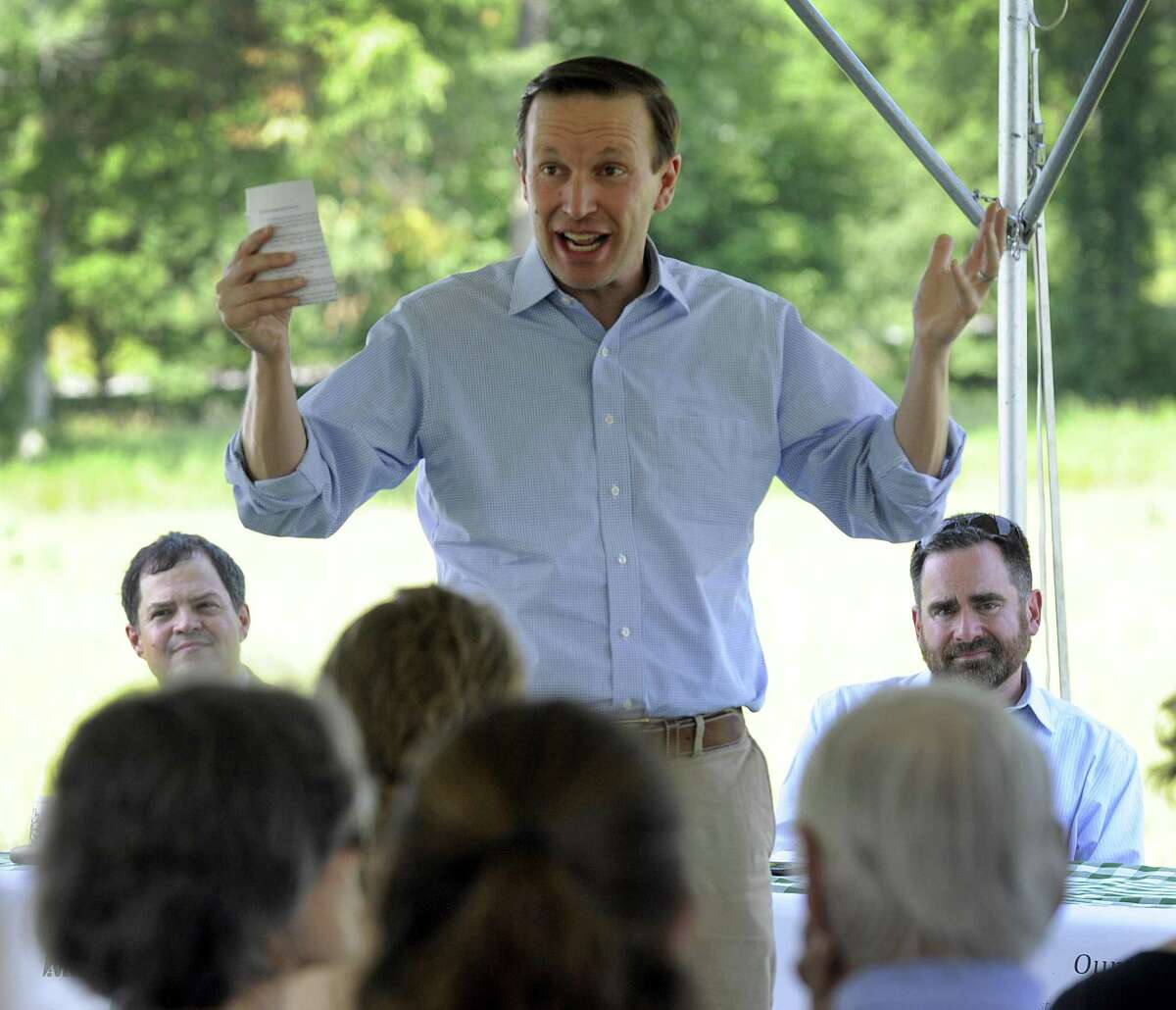U.S. Sen. Chris Murphy speaks Friday at a gathering to celebrate the Highlands Conservation Act. Left is Tim Abbott, Regional Land Conservation director and right is Robert Klee, DEEP commissioner for the state. Several conservation groups are hosted U.S. Sen. Chris Murphy in Kent Friday, July 13, 2018, to celebrate the Highlands Conservation Act, which is one of the most important sources of federal land protection funding in Northwest Connecticut.