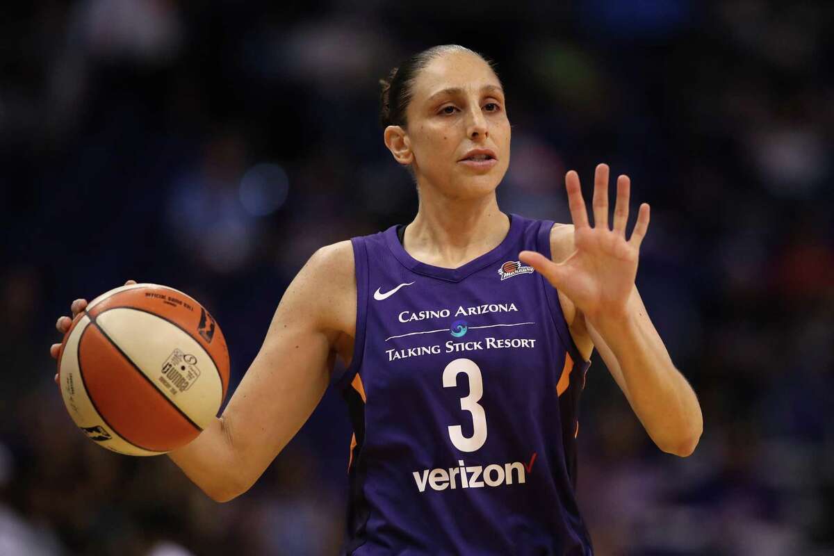 PHOENIX, AZ - JULY 05: Diana Taurasi #3 of the Phoenix Mercury handles the ball during the first half of WNBA game against the Connecticut Sun at Talking Stick Resort Arena on July 5, 2018 in Phoenix, Arizona. NOTE TO USER: User expressly acknowledges and agrees that, by downloading and or using this photograph, User is consenting to the terms and conditions of the Getty Images License Agreement. (Photo by Christian Petersen/Getty Images)