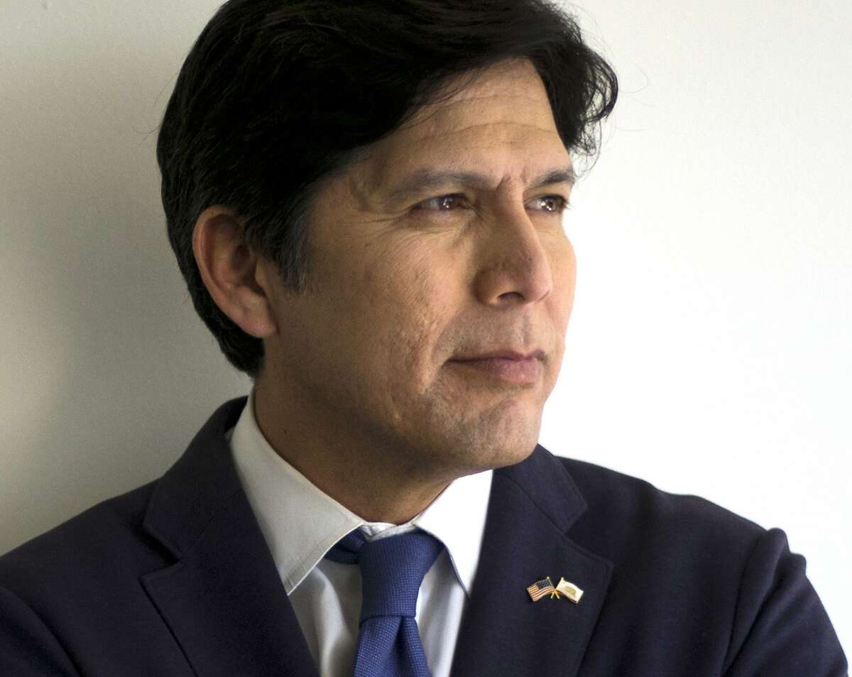 FILE - In this May 3, 2018 file photo, California state Senate President pro Tempore Kevin de Leon, D-Los Angeles, poses for photos in his campaign office in Los Angeles. U.S. Sen. Feinstein is tapping into her political rolodex to convince California Democratic Party leaders to not formally endorse a candidate in her race against fellow Democrat Kevin de Leon. She says it's to avoid an intraparty fight, but her effort if successful will thwart her longshot rival's very real change at capturing the party nod when the committee votes Saturday, July 14, 2018. (AP Photo/Jae C. Hong, File)