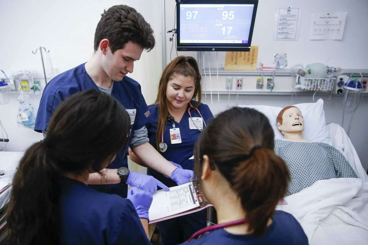 Male and female nurses doing the same job. Guess who makes