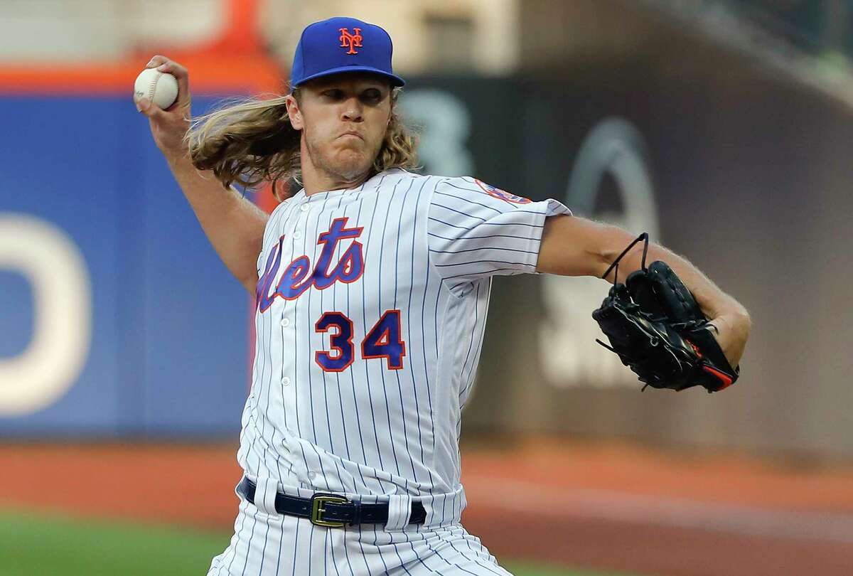 New York Mets starting pitcher Noah Syndergaard delivers against the Washington Nationals during the first inning of a baseball game Friday, July 13, 2018, in New York. (AP Photo/Julie Jacobson)