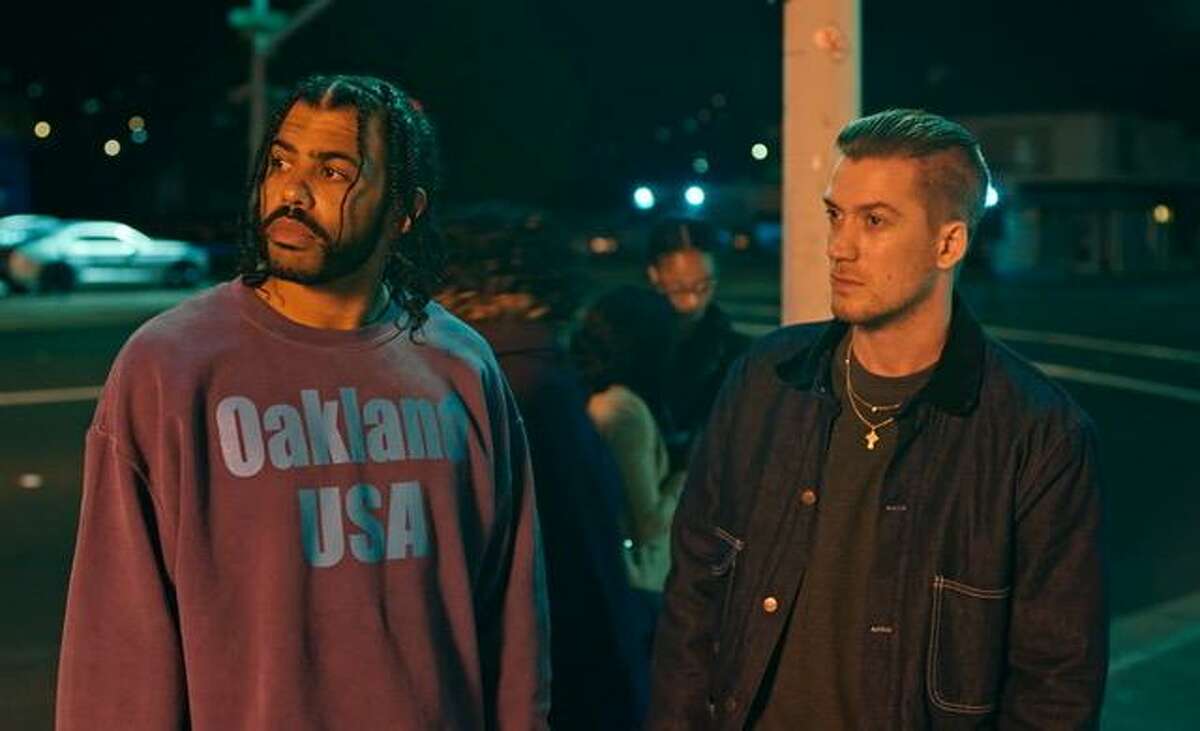 Friends Collin (Daveed Diggs) and Miles (Rafael Casal) navigate gentrification and tensions between police and citizens in the Oakland-set film “Blindspotting.”