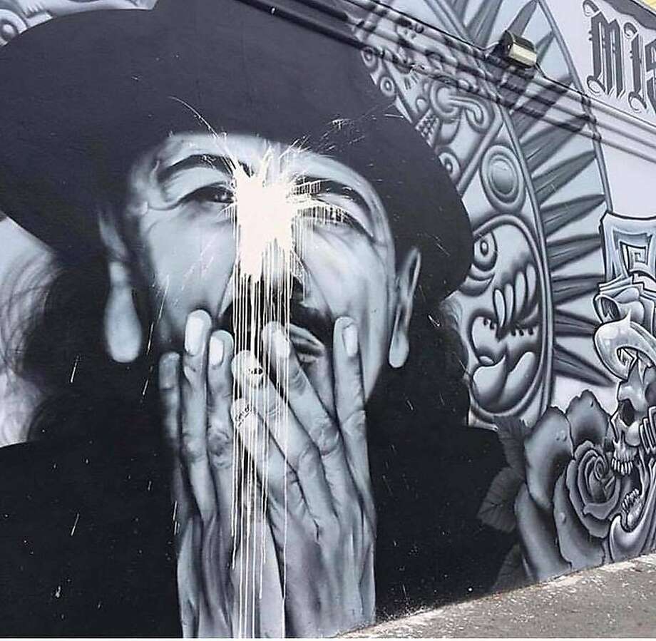 mission district mural depicting carlos santana vandalized