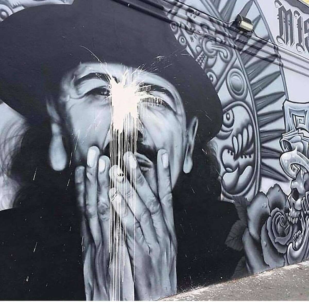 A mural of Carlos Santana at 19th and Mission streets was vandalized on July 14, 2018 with what appeared to be white paint. The muralist later restored the mural.