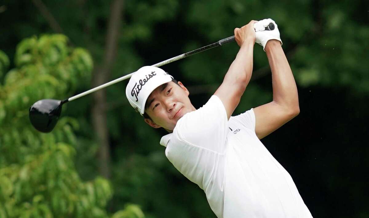 Michael Kim hits off the second tee during the third round of the John Deere Classic golf tournament, Saturday, July 14, 2018, at TPC Deere Run in Silvis, Ill. (AP Photo/Charlie Neibergall)