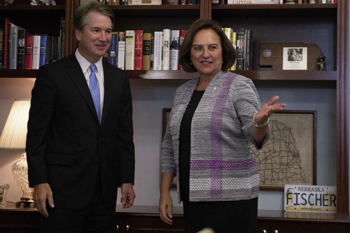 WASHINGTON, DC - JULY 12: Sen. Deb Fischer (R-NE) greets Judge Brett Kavanaugh as he arrives at her office prior to a meeting in the Russell Senate Office Building on July 12, 2018 in Washington, DC. Kavanaugh is meeting with members of the Senate after U.S. President Donald Trump nominated him to succeed retiring Supreme Court Associate Justice Anthony Kennedy. (Photo by Alex Edelman/Getty Images)
