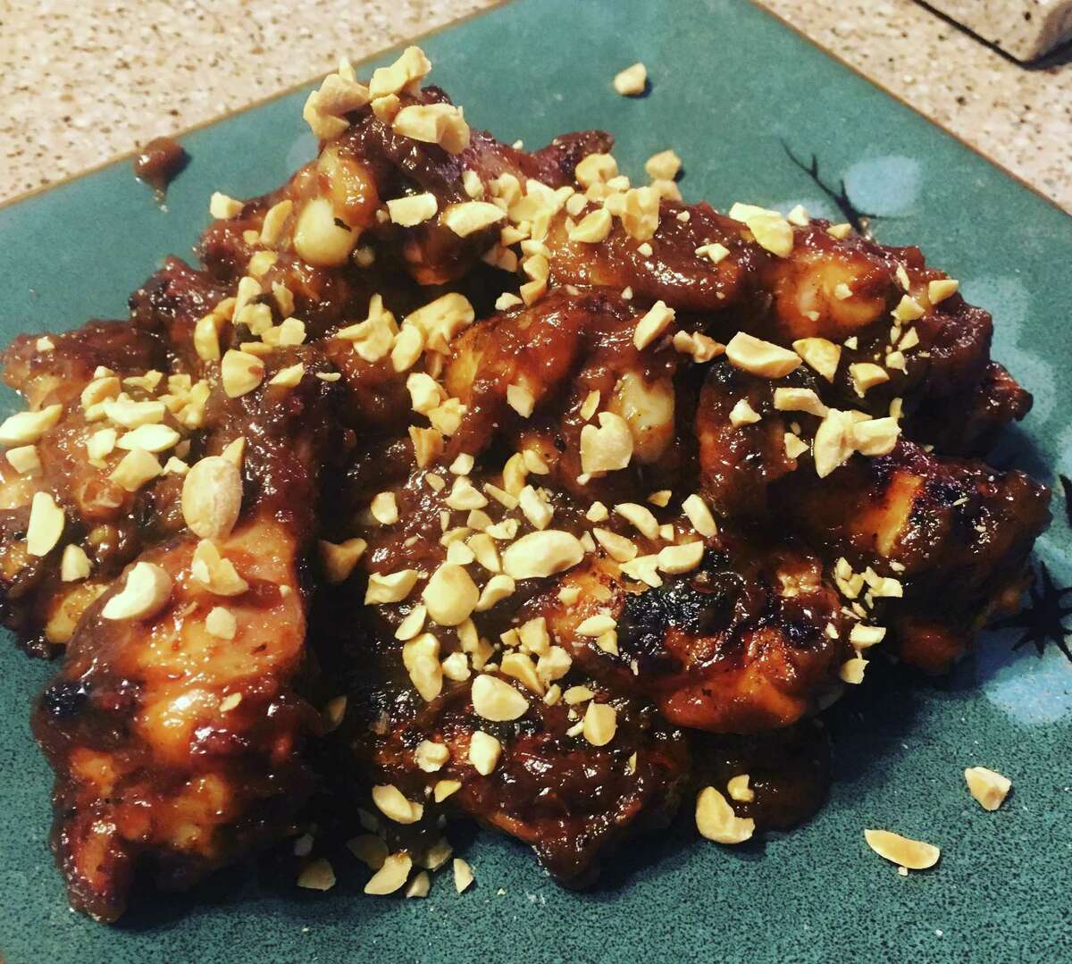 Peanut butter and jelly wings fresh off the grill.