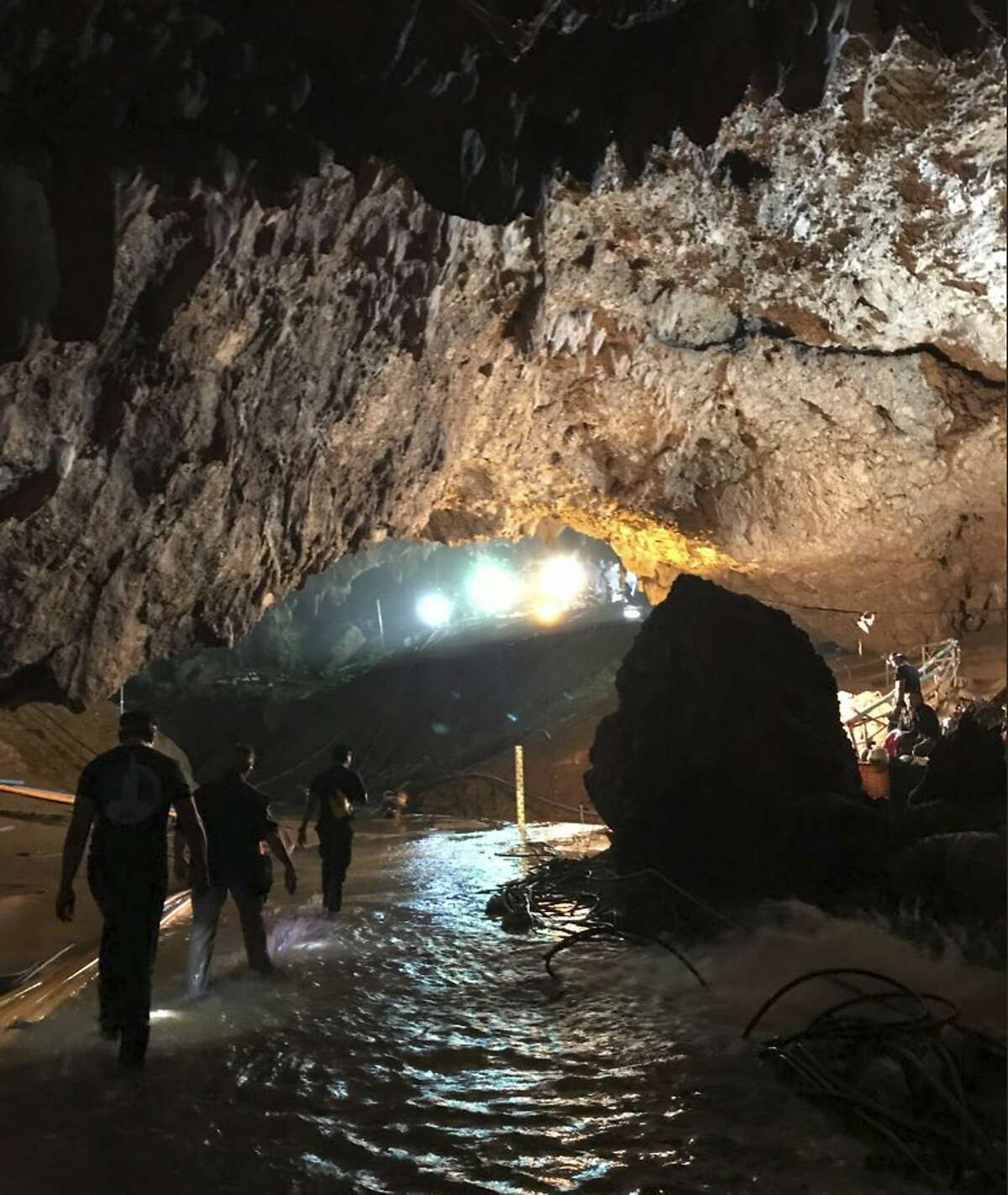 This photo tweeted by Elon Musk shows efforts underway to rescue trapped members of a youth soccer team from a flooded cave in northern Thailand. Musk tweeted early Tuesday, July 10, 2018, he has visited the cave and has left a mini-submarine there for future use. (Courtesy of Elon Musk via AP)
