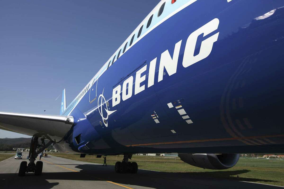 The Boeing logo is seen on the fuselage of the company's 787 Dreamliner during a media preview of the Seoul International Aerospace & Defense Exhibition 2011 in Seongnam, South Korea, on Oct. 17, 2011.