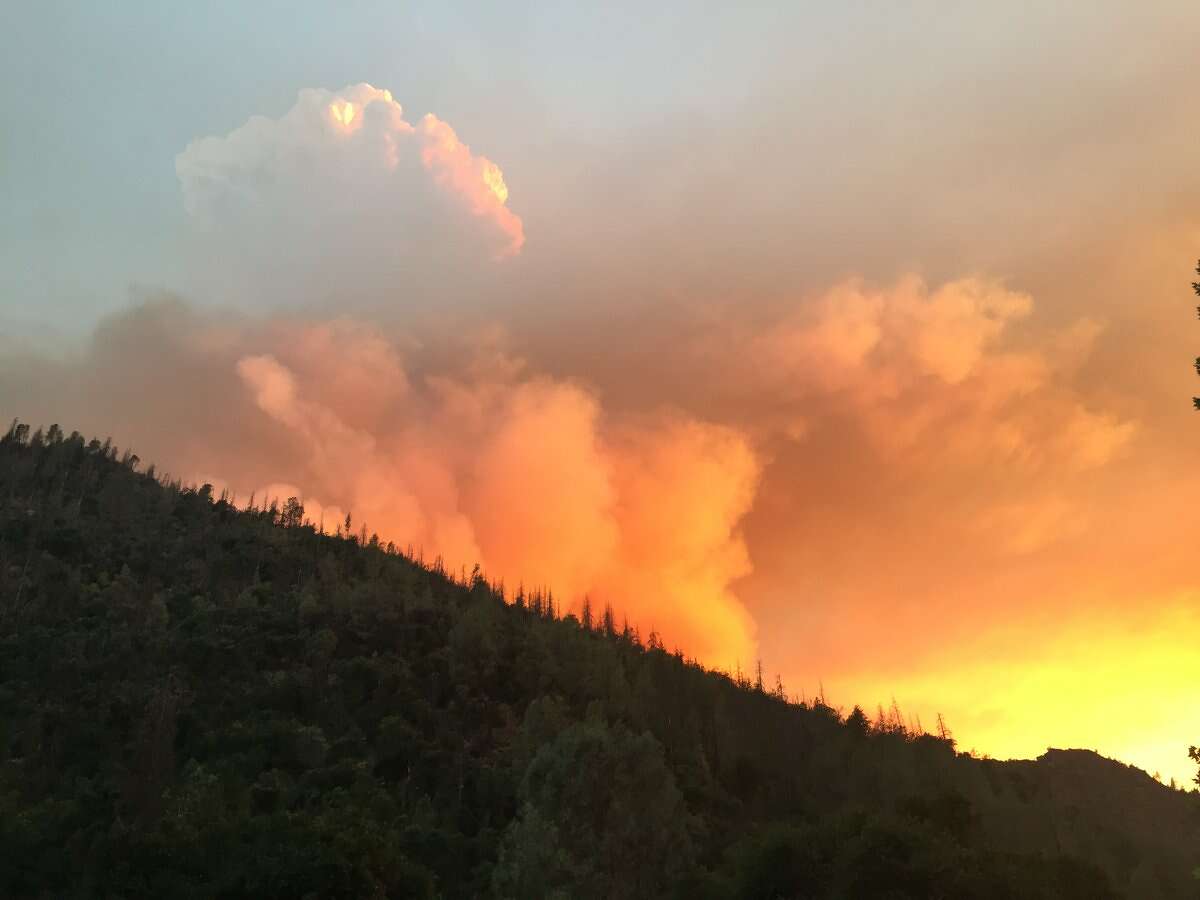 The Ferguson Fire, burning in steep, rugged terrain  in Sierra National Forest on Sunday, July 16, 2018.  It has closed Highway 140  and is threatening a number of structures.