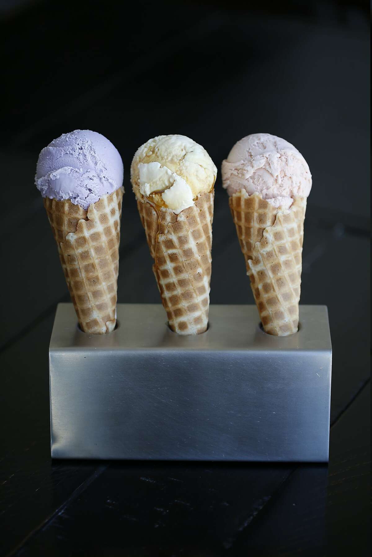 Left to right, Ube (made from purple yams), Flan, and Fruity Pebbles Ice Cream is featured at Mr. and Mrs. Miscellaneous on Monday, July 16, 2018 in San Francisco, Calif.