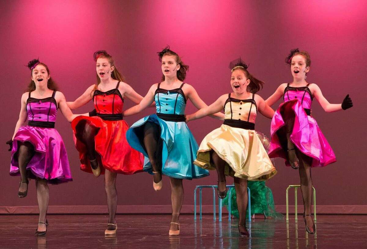 Dancers, from left to right, McKenna Riedl, Kati Seppa, Aili Seppa, Phebe Seppa and Emerson Riedl, sing ”She’s in Love,” with choreography by theater dance teacher Shannon McLean.