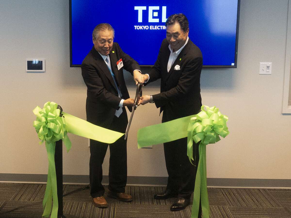 Tony Kawai, left, the CEO of Tokyo Electron, was at SUNY Poly's Albany campus Monday to celebrate the 15-year anniversary, along with Terry Higashi, TEL's corporate director. They also held a ribbon cutting for an expansion at TEL. (Provided photo)