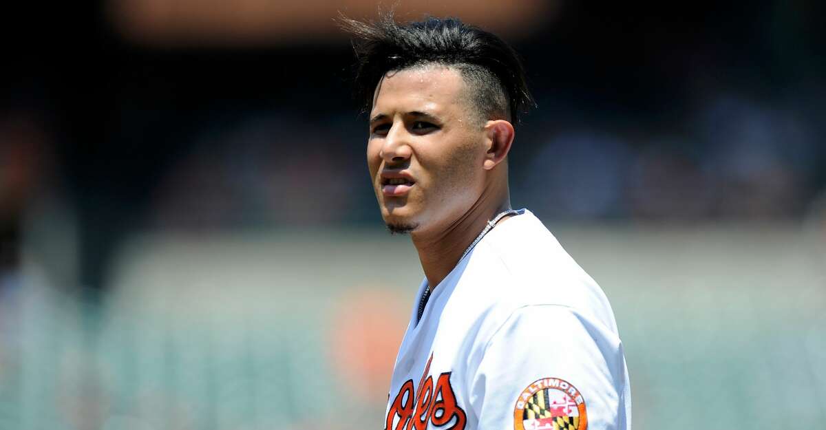 BALTIMORE, MD - JULY 01: Manny Machado #13 of the Baltimore Orioles walks to the dugout during the game against the Los Angeles Angels at Oriole Park at Camden Yards on July 1, 2018 in Baltimore, Maryland. (Photo by G Fiume/Getty Images)