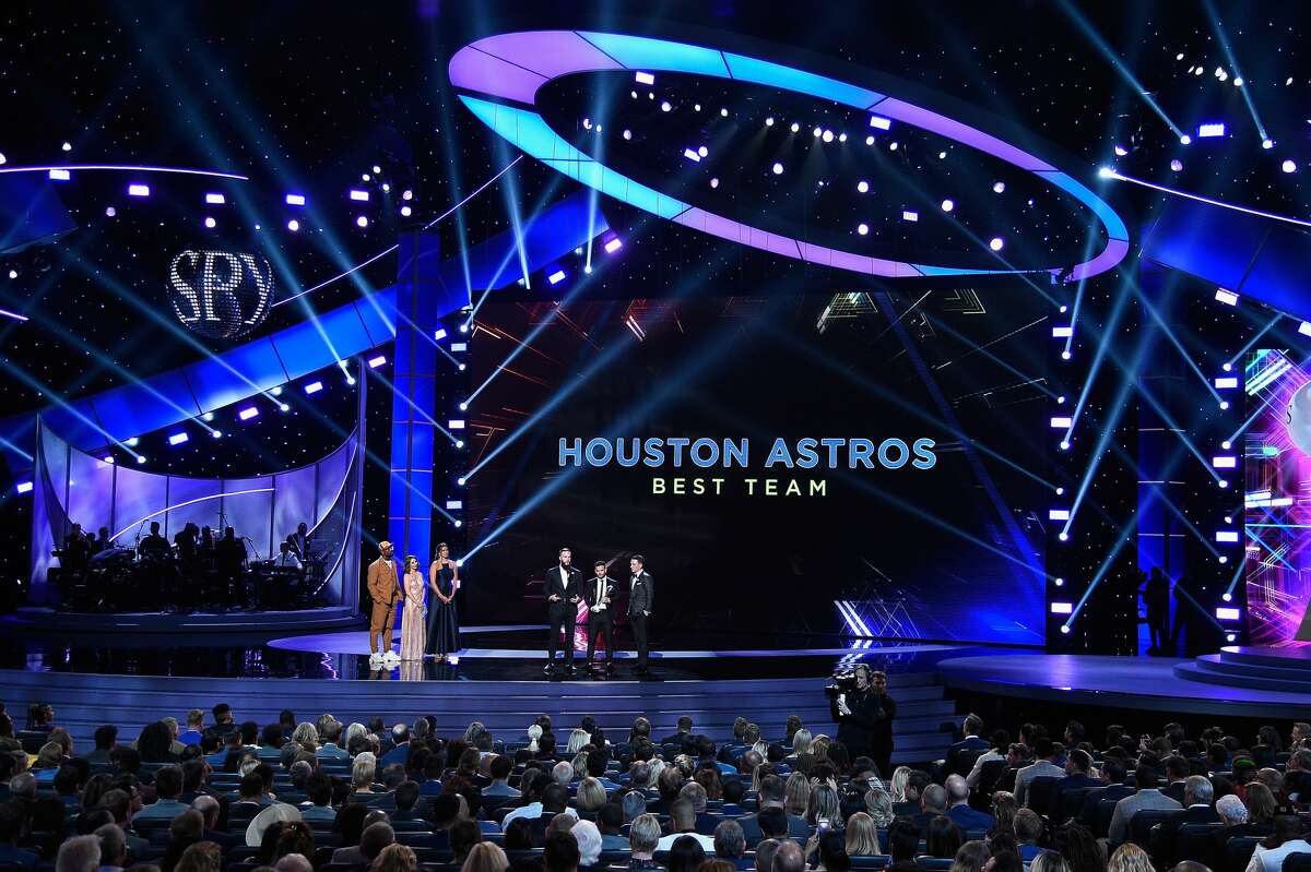 LOS ANGELES, CA - JULY 18: MLB players Dallas Keuchel, Jose Altuve and Alex Bregman of the Houston Astros accept the award for Best Team from NFL player Von Miller and actor Alison Brie onstage at The 2018 ESPYS at Microsoft Theater on July 18, 2018 in Los Angeles, California. (Photo by Kevork Djansezian/Getty Images)