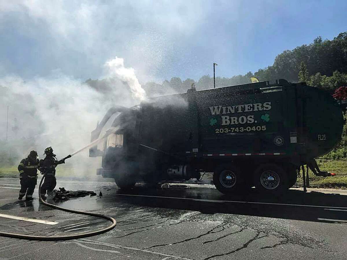 Southbound Route 8 was shut down for about an hour after a Winters Bros garabage truck caught fire on Wednesday, July 18, 2018 in Seymour. The fire, reported shortly after 4 p.m., happened near Exit 20 and the Haynes Outdoor Living Center. Fortunately no one was injured in the fire, but the vehicle was ... trashed.