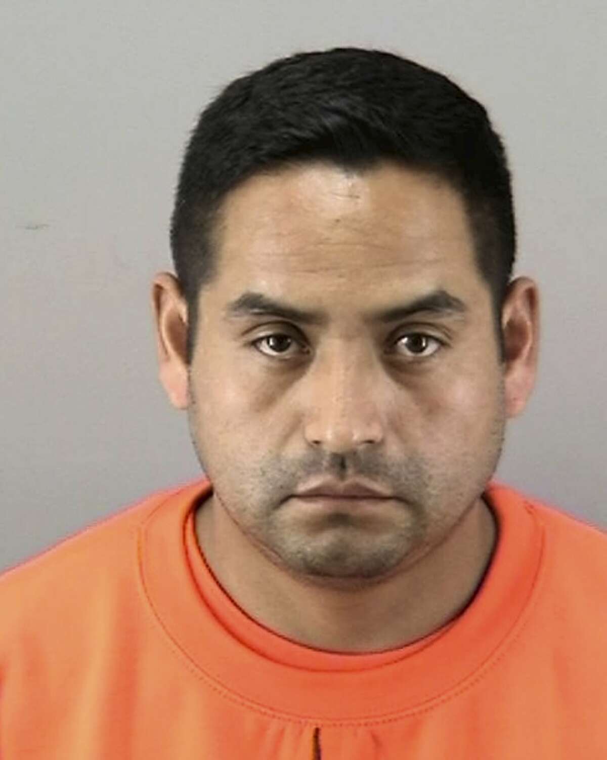 FILE - This file booking photo released by the San Francisco Police Department shows Orlando Vilchez Lazo. Federal immigration authorities say Lazo, a suspected serial rapist charged with posing as a Northern California ride-hailing driver to prey on his victims was living in the United States illegally. The U.S. Immigration and Customs Enforcement agency said Tuesday, July 17, 2018, it plans to deport Orlando Vilchez Lazo to his native Peru if he is released from custody. (San Francisco Police Department via AP, File)