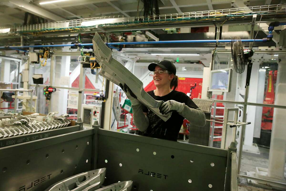 Touring Tesla’s Model 3 production line, ‘the machine to build the machine’