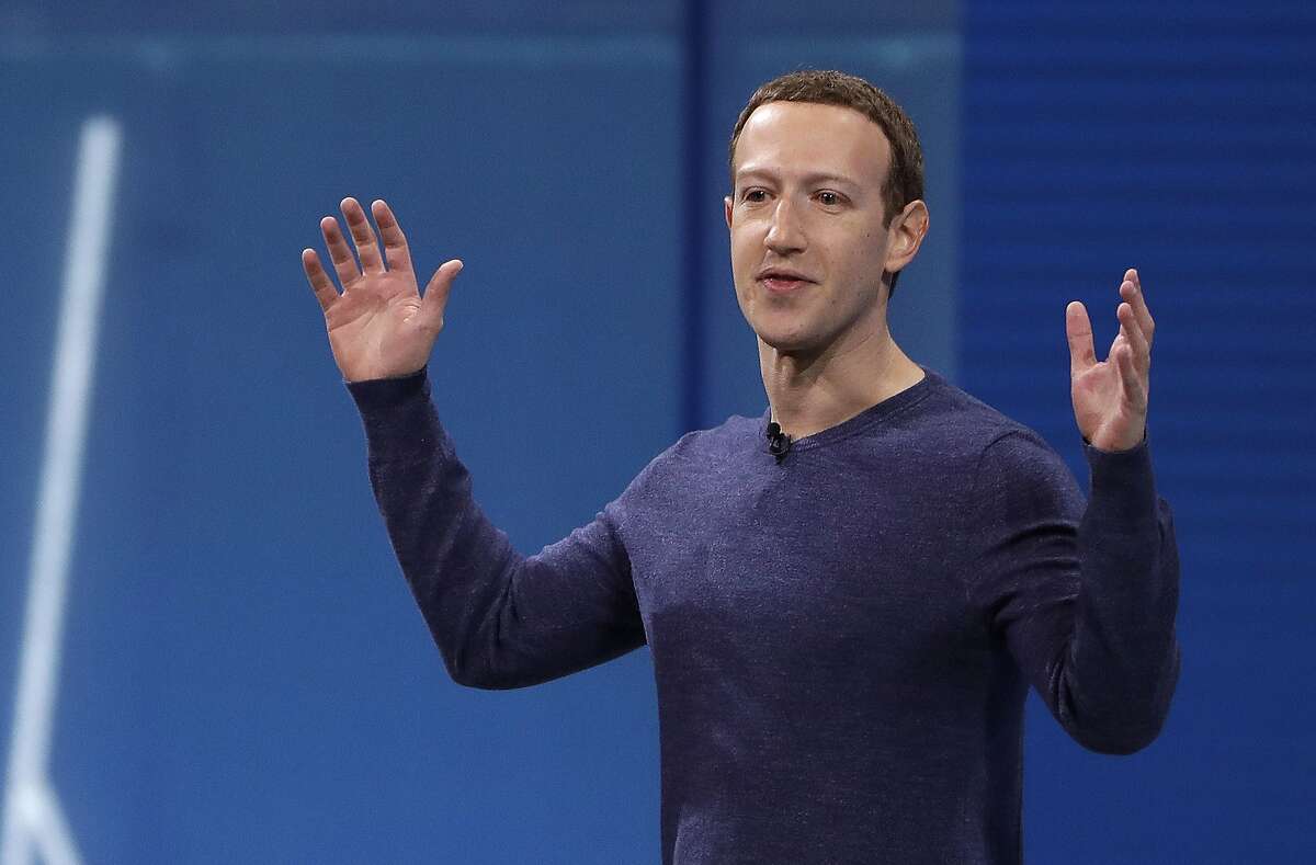 FILE - In this May 1, 2018, file photo, Facebook CEO Mark Zuckerberg makes the keynote address at F8, Facebook's developer conference in San Jose, Calif. Remarks from Zuckerberg have sparked criticism from groups such as the Anti-Defamation League. Zuckerberg, who is Jewish, told Recode's Kara Swisher in an interview that although he finds Holocaust denial "deeply offensive," such content should not be banned from Facebook. (AP Photo/Marcio Jose Sanchez, File)