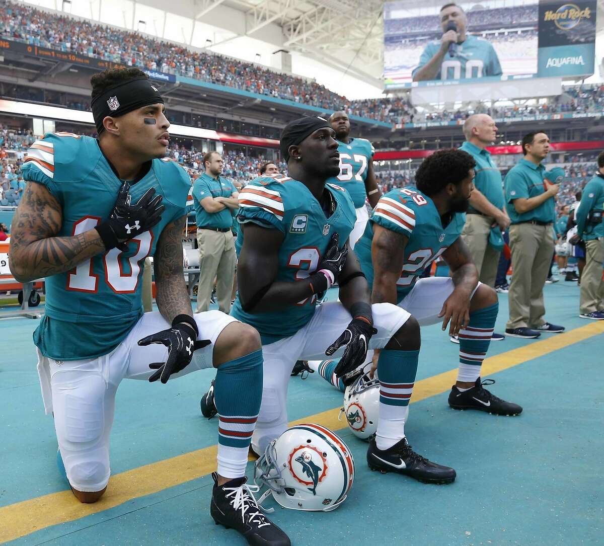 Aug 9, 2018 - Dolphins' Kenny Stills (10) and Albert Wilson protest during national anthem, drawing heat from a vacationing Trump and praise from Kaepernick, repeating a now recognizable cycle. In this Sunday, Oct. 23, 2016, file photo, Stills, free safety Michael Thomas (31) and defensive back Chris Culliver (29) kneel during the National Anthem before a game against the Buffalo Bills in Florida.