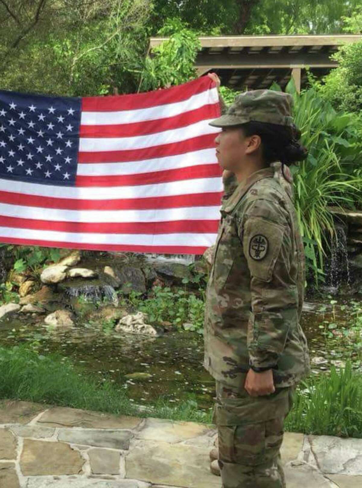 Spc. Yea Ji Sea, a combat medic at Joint Base San Antonio-Fort Sam Houston, re-enlisted in the Army last December after serving for four years. A Korean national who has sought U.S. citizenship, she learned Thursday she was discharged.