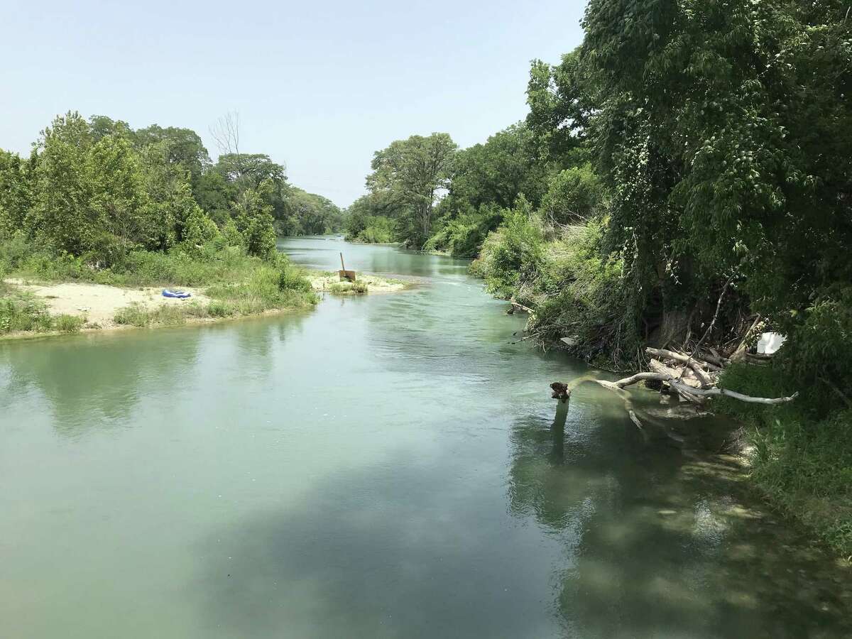 The San Marcos River flows through downtown Martindale.