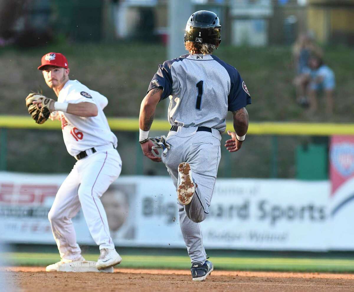 Brooklyn Cyclones Manny Rodriguez (1) is out as Tri-City ValleyCats second baseman Austin Dennis (16) makes the double play during a minor league baseball game Thursday, July 19, 2018, in Troy, N.Y. (Hans Pennink / Special to the Times Union)
