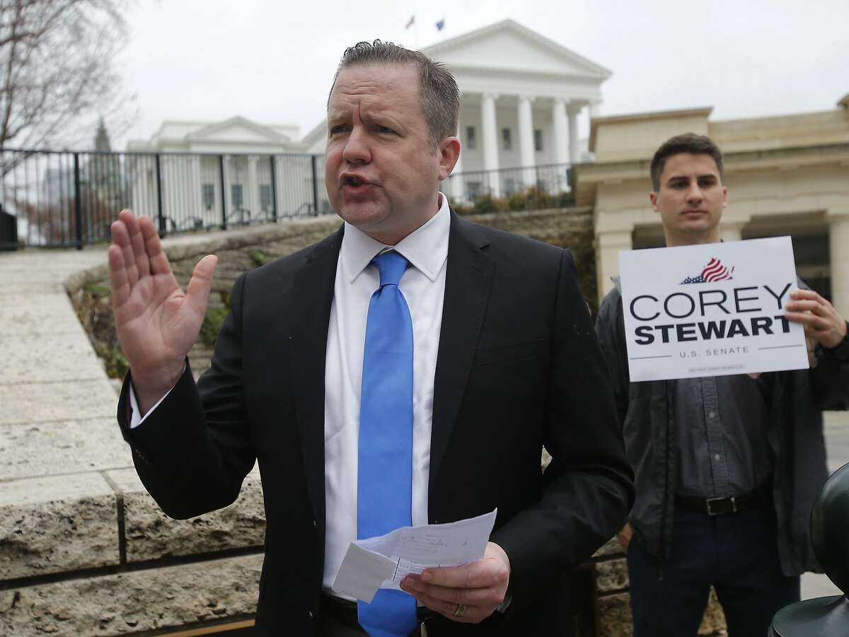 FILE - In this Feb. 22, 2018, file photo, Virginia GOP senatorial hopeful, Corey Stewart, gestures during a news conference at the Capitol in Richmond, Va. A tea party group backed by billionaire conservatives plans to sit out the U.S. Senate race in Virginia. News outlets report that Americans for Prosperity will not support Republican nominee Stewart as he tries to unseat incumbent Democratic Sen. Tim Kaine. (AP Photo/Steve Helber, File)