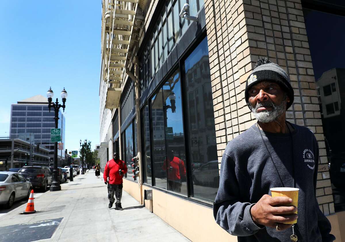 Rufus Boykin (name and age he provided to me), 70, stands outside the Henry Robinson Center, a transitional housing facility, in downtown Oakland, Cali. on Wednesday, July 18, 2018. "I want to work my way back into society," said Boykin, who once lived on the streets. "I have power - I just have to figure out how to use it."