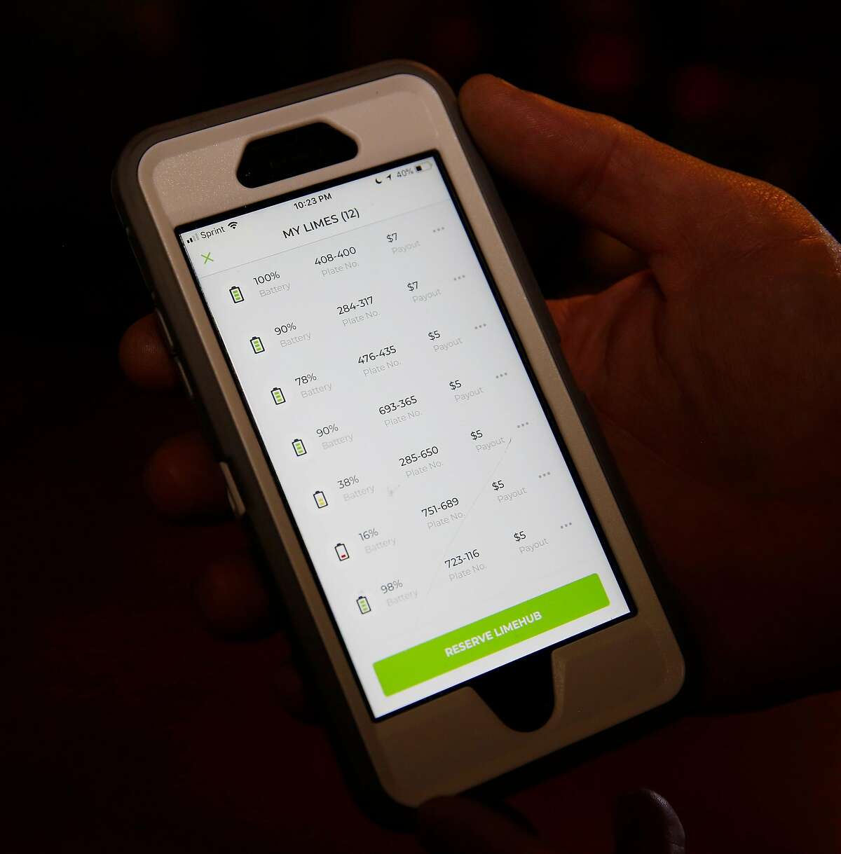 David Padover, who is a Juicer for Lime-S and Bird, keeps track of charge percentage on phone for all the harvest scooters of the night at his home in San Jose, California on July16, 2018. (Josie Lepe/Special to the Chronicle)