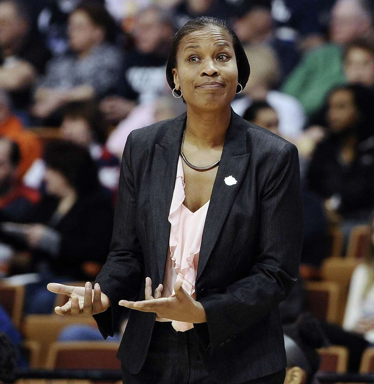 Former Cincinnati women’s basketball coach Jamelle Elliot, a former player at UConn, is back at the school in an administrative capacity.
