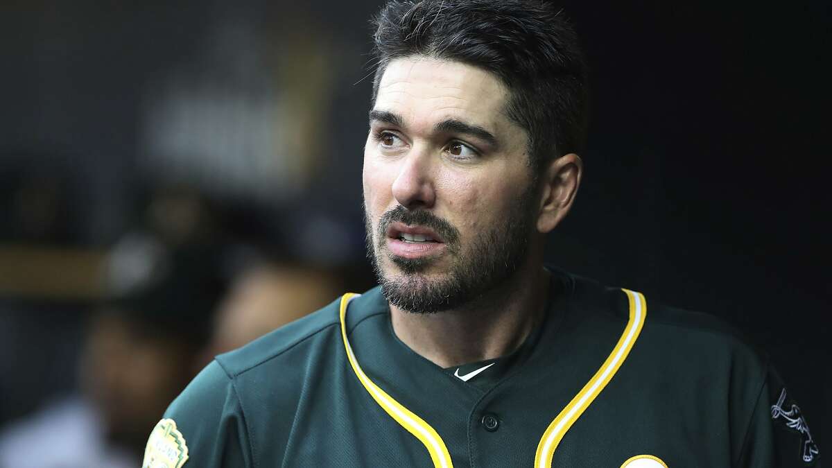 Oakland Athletics' Matt Joyce is seen in the dugout during the third inning of a baseball game against the Detroit Tigers, Wednesday, June 27, 2018, in Detroit. (AP Photo/Carlos Osorio)