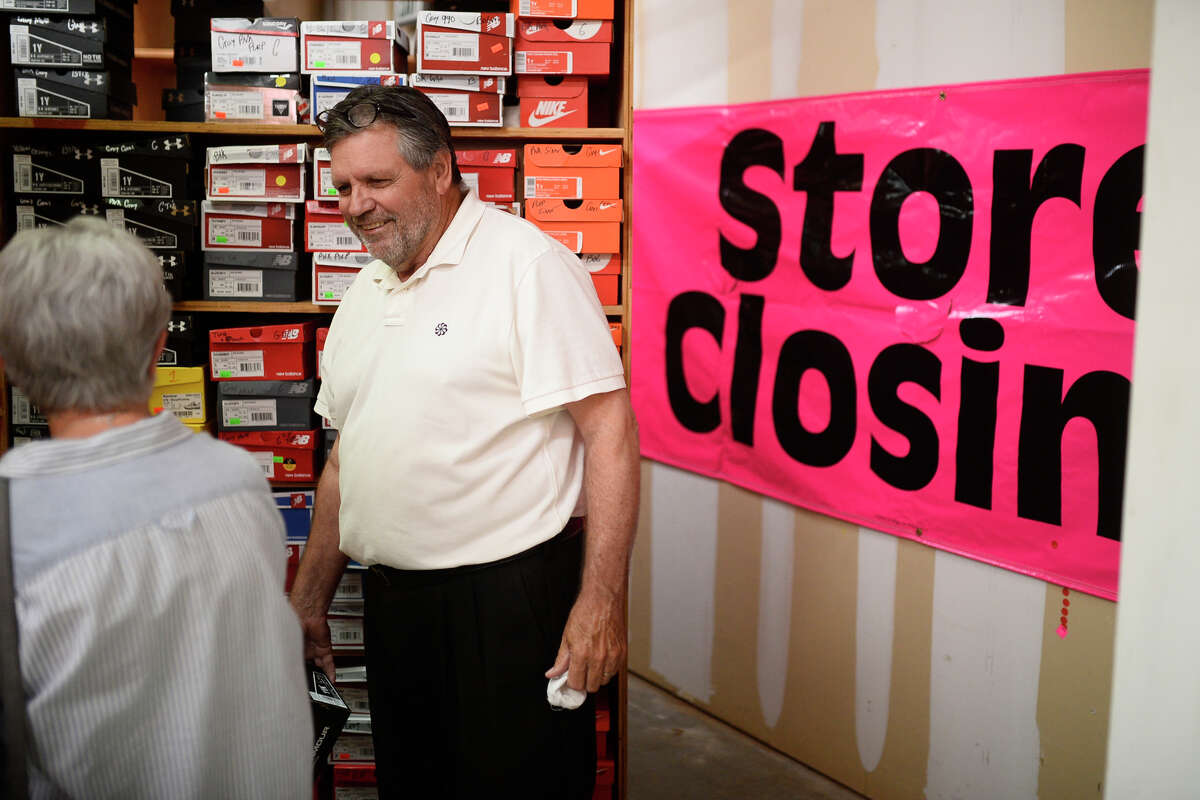Terry Sevart, founder and former owner of Terry's Kids Shoes, chats with customers during a closing sale July 21, 2018. The Midland store underwent an ownership change in 2016 but has been open for 18 years. Sales will continue until all inventory is gone. James Durbin/Reporter-Telegram