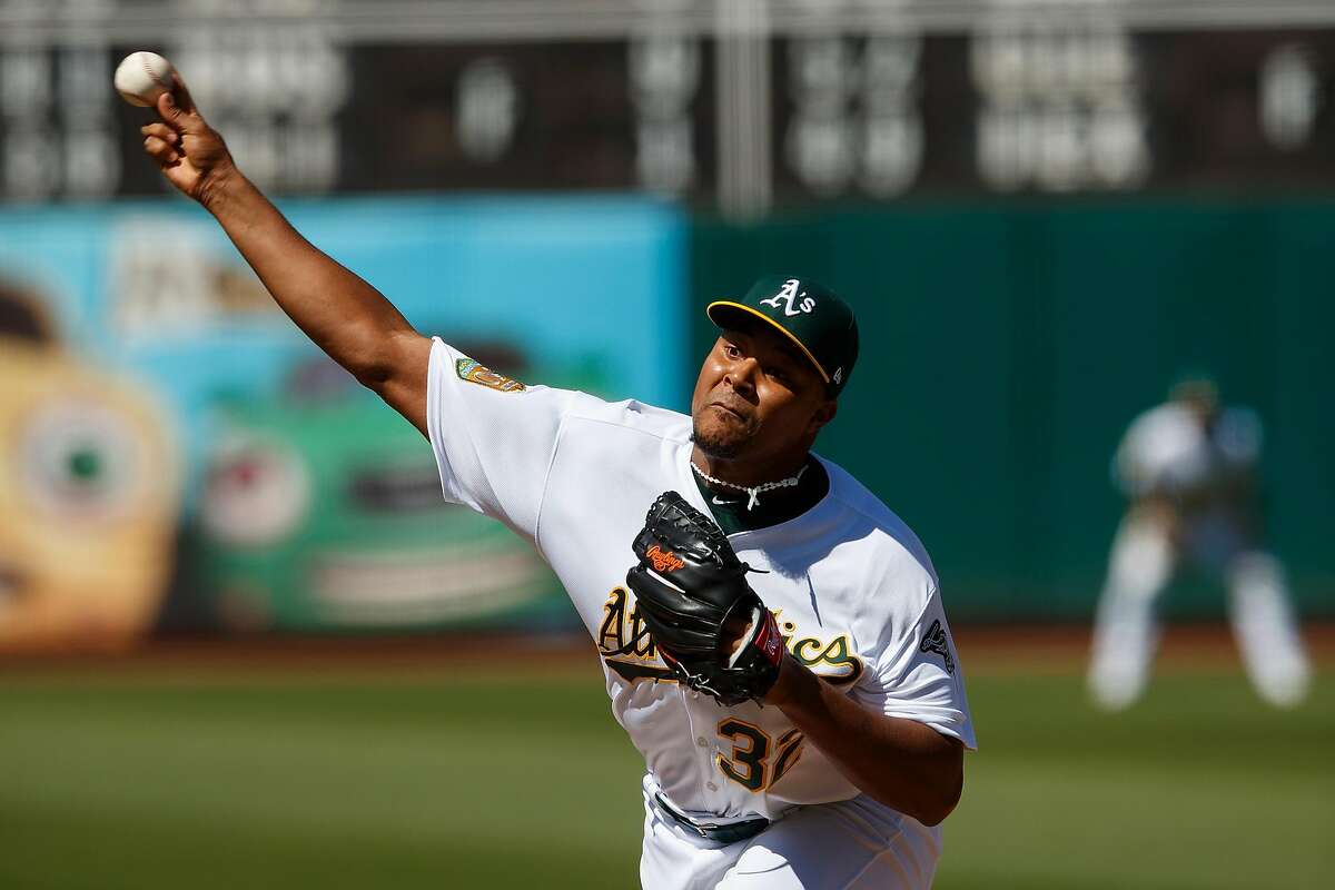 OAKLAND, CA - JULY 22: Jeurys Familia #32 of the Oakland Athletics pitches against the San Francisco Giants during the ninth inning at the Oakland Coliseum on July 22, 2018 in Oakland, California. The Oakland Athletics defeated the San Francisco Giants 6-5 in 10 innings. (Photo by Jason O. Watson/Getty Images)