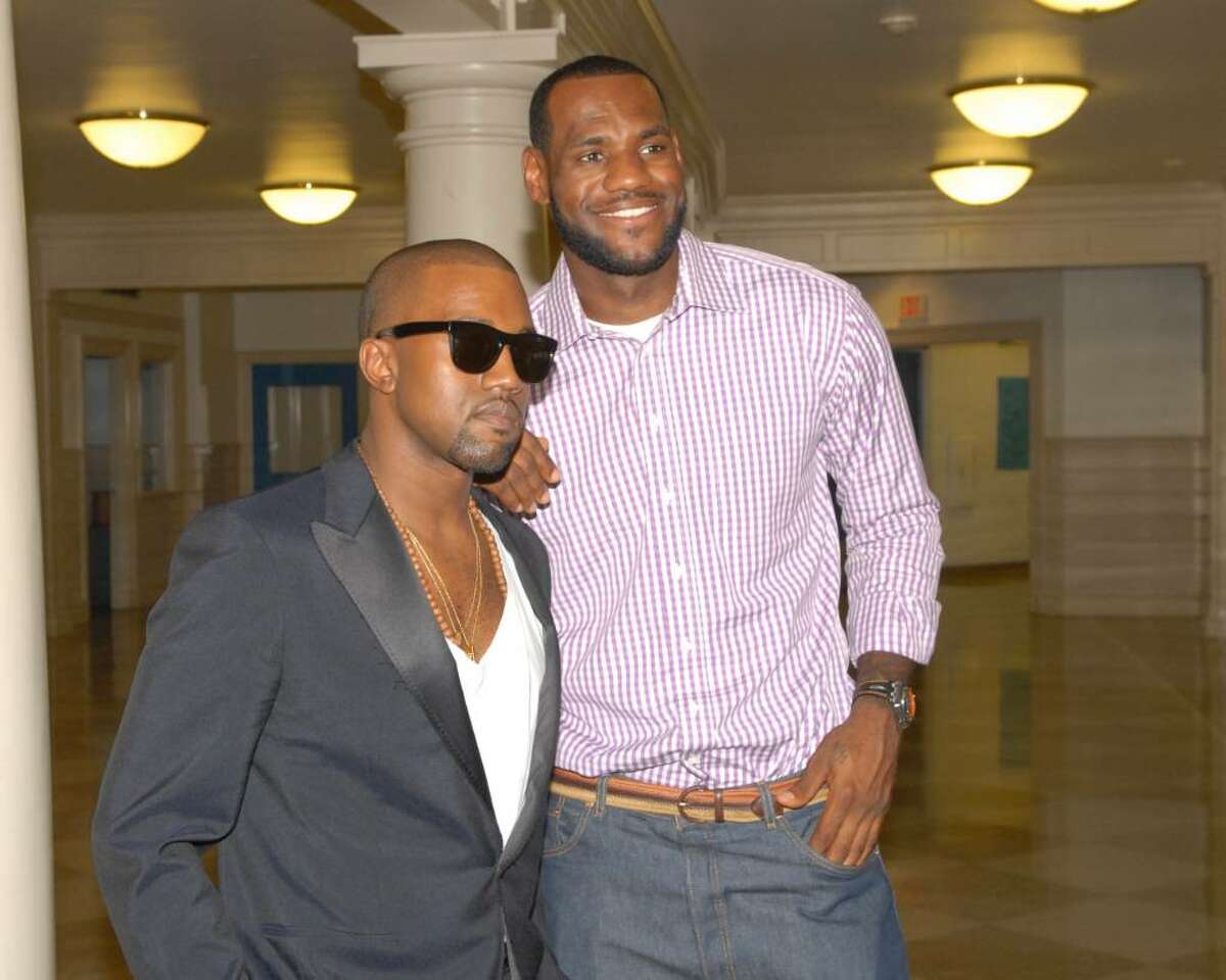 Rapper Kanye West, left, and basketball superstar LeBron James strike a pose at the Boys & Girls Club of Greenwich, Thursday evening, July 8, 2010, where James announced that he will be playing for the Miami Heat next season.
