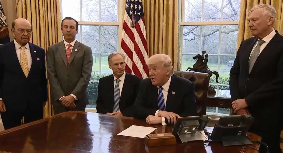 Charter Communications CEO Thomas Rutledge, far right, with President Donald Trump in the Oval Office in March 2017.