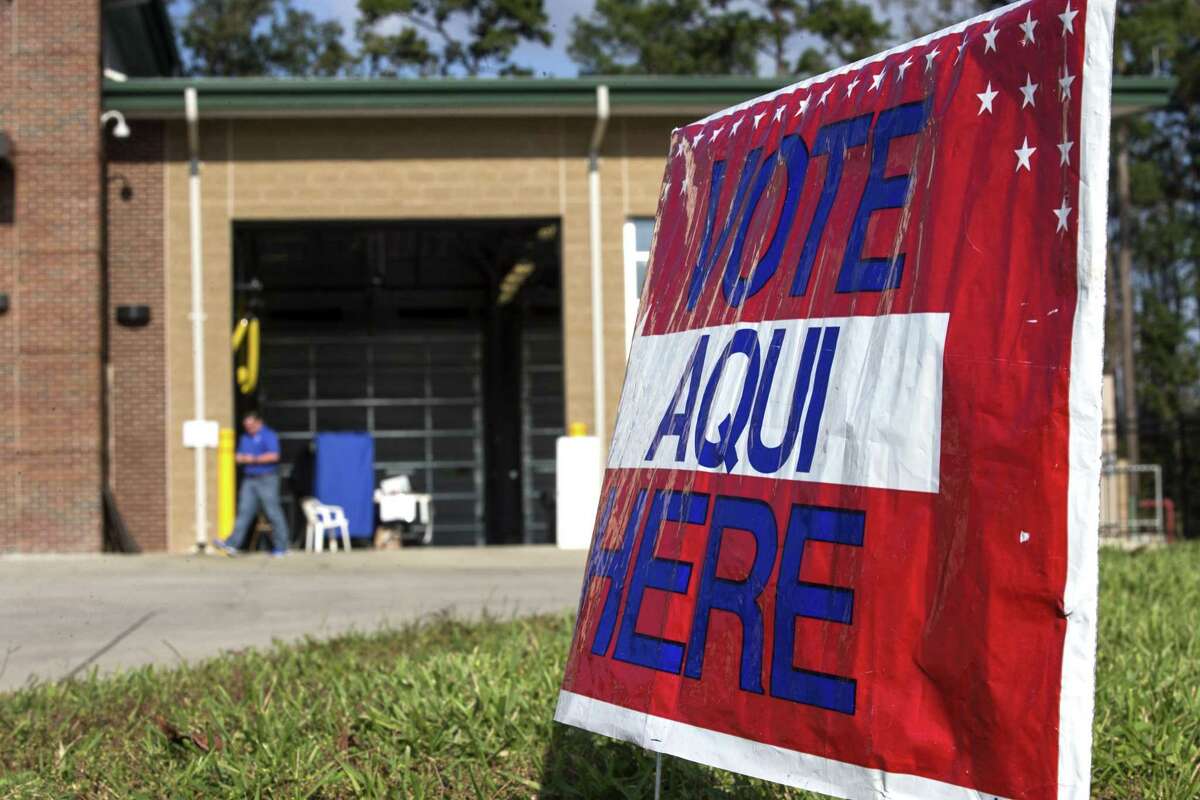 Voters line up to cast their ballots at South Montgomery County Fire Station 4 on Tuesday, Nov. 3, 2015, in Spring. ( Brett Coomer / Houston Chronicle )