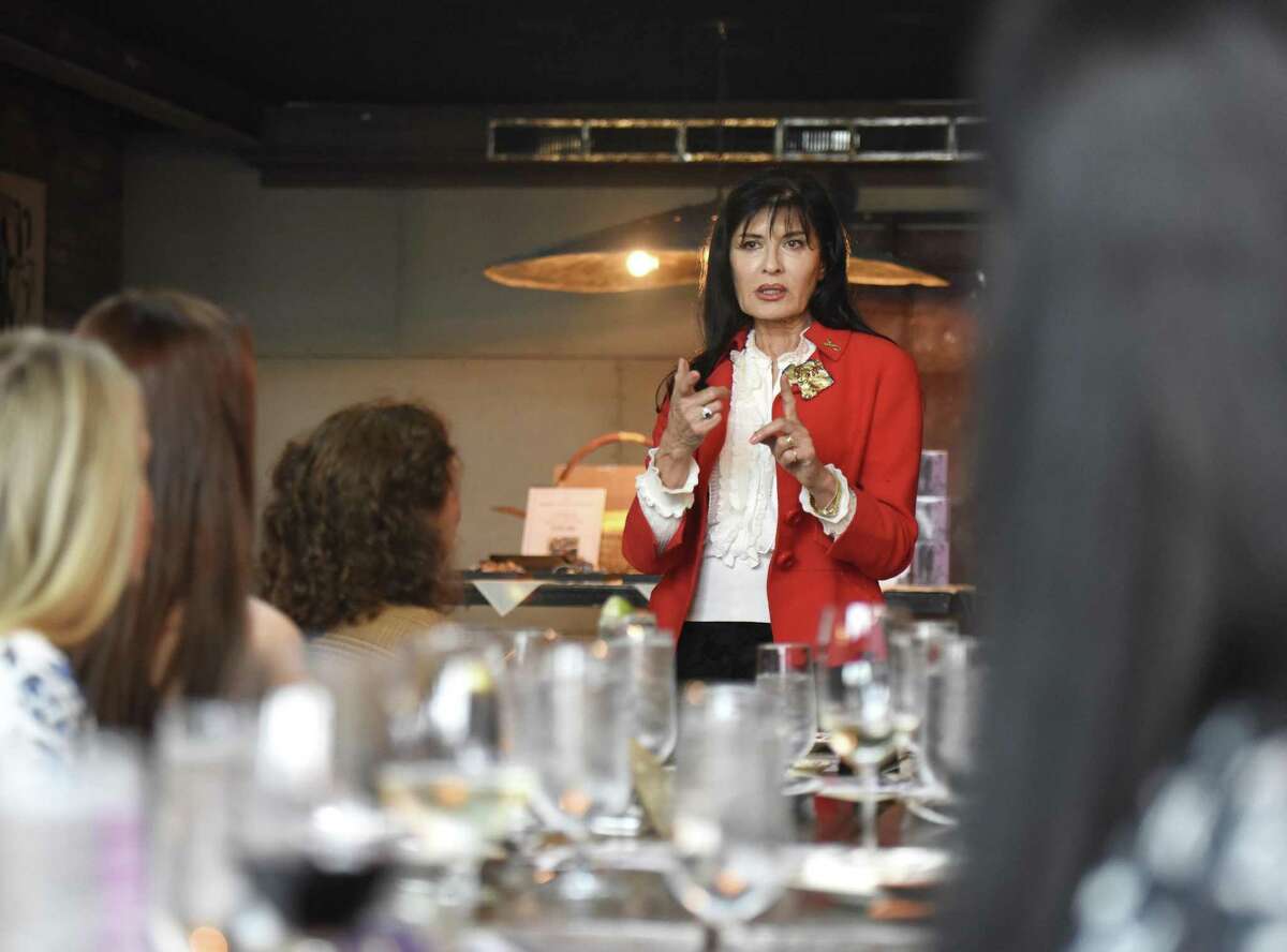 Friends of Autistic People (FAP) founder Brita Darany von Regensburg introduces Miss Connecticut 2017 Olga Litvinenko to speak at the Friends of Autistic People (FAP) luncheon fundraiser at The Spread in Greenwich, Conn. Thursday, April 19, 2018. Litvinenko spoke about her inspiring journey to become Miss Connecticut. The luncheon celebrated FAP's 20-year commitment to advocacy, education, and serving kids and adults with autism. There was also a live auction for jewelry, accessories, and a gift certificate for a one-on-one dinner with Miss Connecticut.
