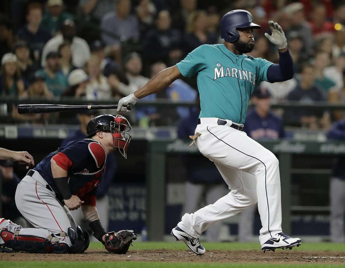 Seattle Mariners' Denard Span follows through after he hit a go-ahead two-run double against the Boston Red Sox during the eighth inning of a baseball game, Friday, June 15, 2018, in Seattle. The Mariners won 7-6. (AP Photo/Ted S. Warren)