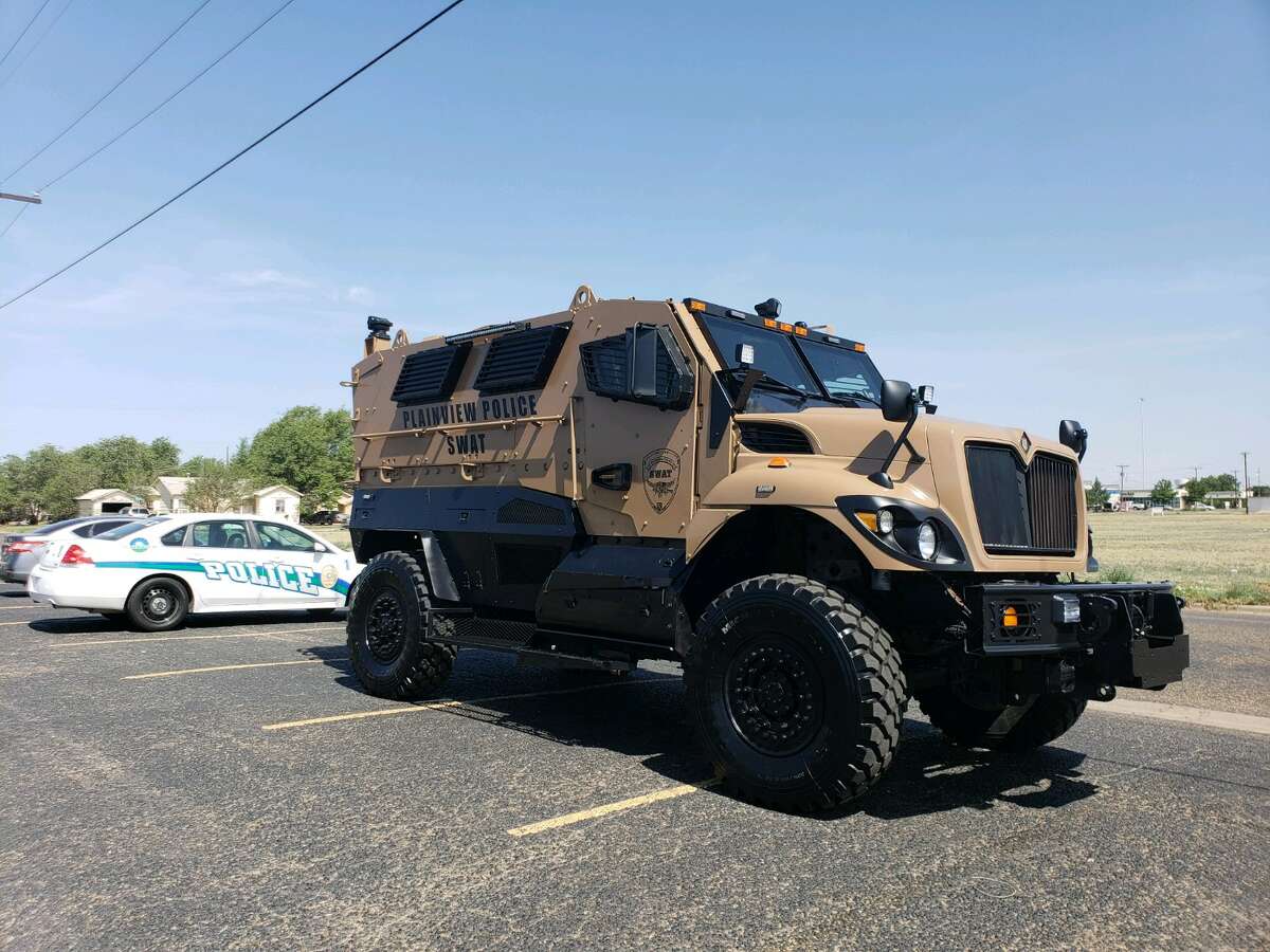 Plainview Police Department’s SWAT team showcased the newest addition to its fleet – a newly restored military truck.